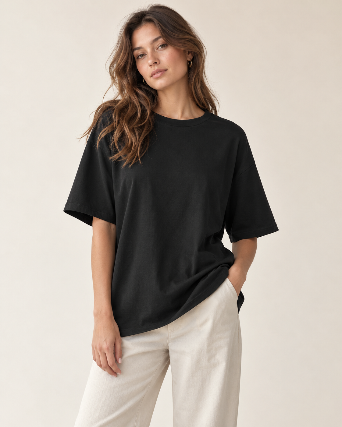 Woman wearing Maison Aria essential oversized t-shirt in black