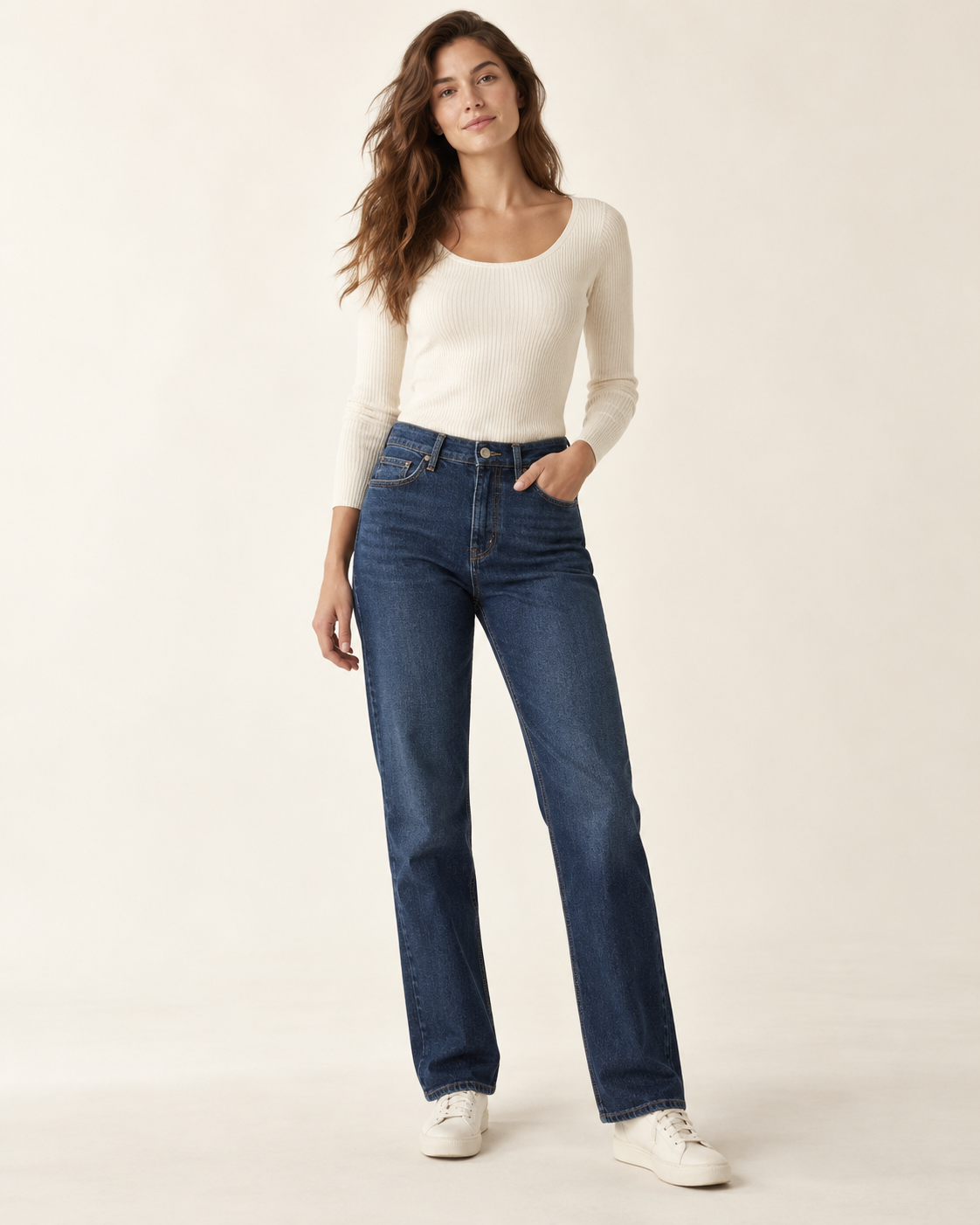 Woman wearing Maison Aria straight-leg denim in blue
